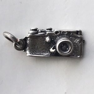Silver charm - tiny photo camera